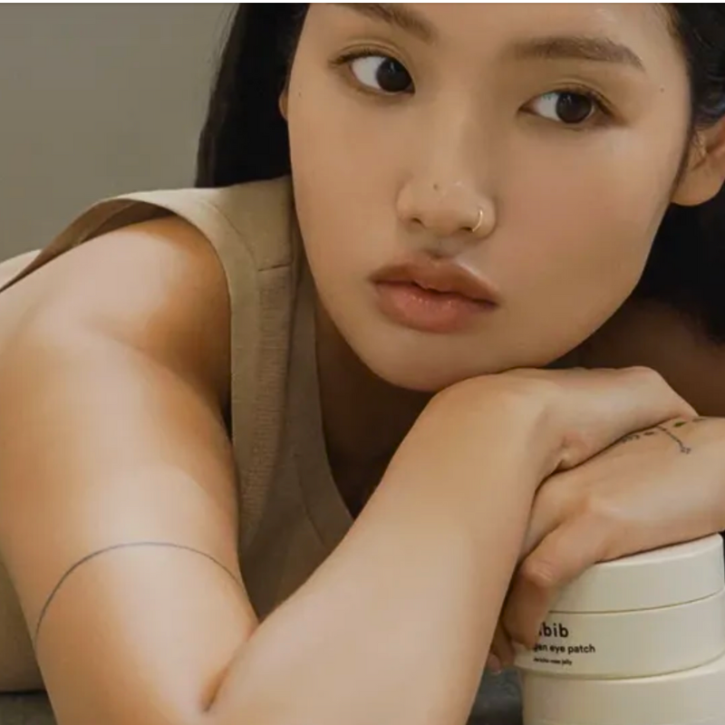 Woman holding a container with 'bib' branding