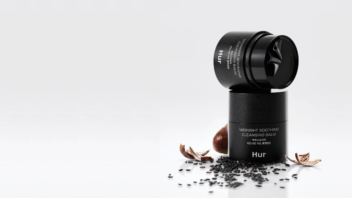 Black cosmetic container with 'Hur' branding on a white background