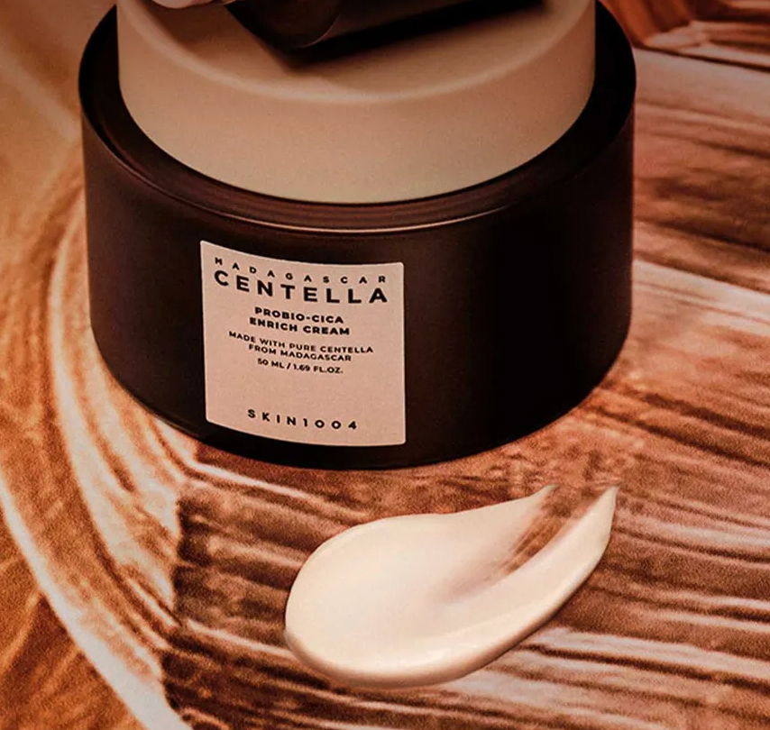 Skincare product with a label on a textured surface