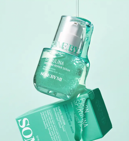 Sculpted serum bottle with packaging on a light blue background
