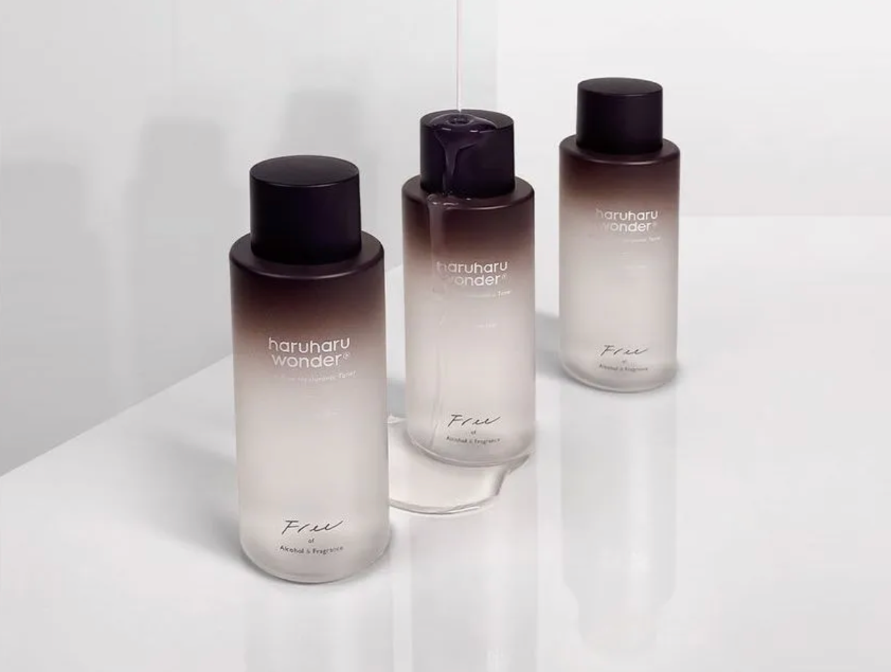 Three bottles of 'hanuharu wonder' on a white background