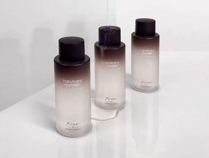 Three bottles of 'hanuharu wonder' on a white background