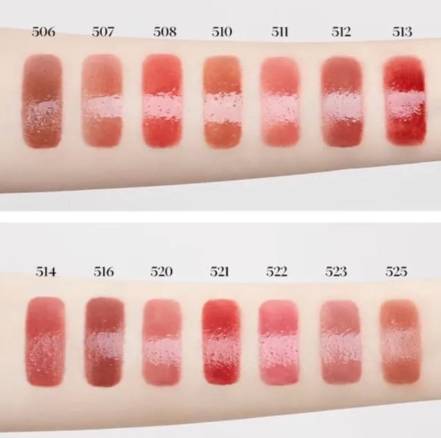 Swatches of lipstick shades on a beige background
