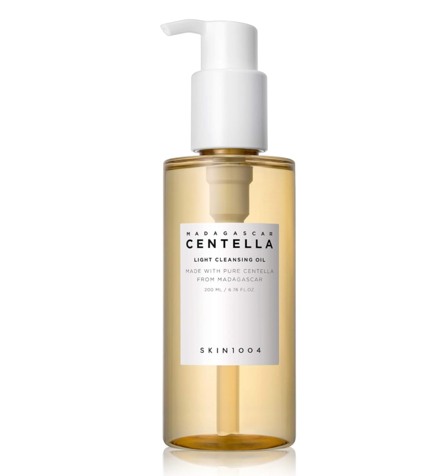 Bottle of Madagascan Centella light cleansing oil with a white pump on a white background