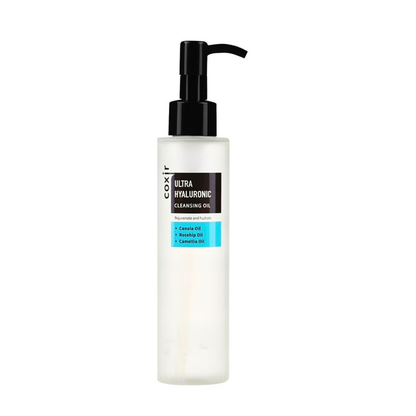 Cleansing oil bottle with pump on a white background