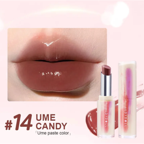 Lipstick with 'UME CANDY' color on a close-up of lips and packaging.